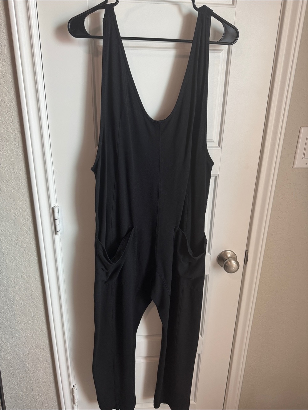 Black Sleeveless Scoop-Neck Jumpsuit with Pockets
